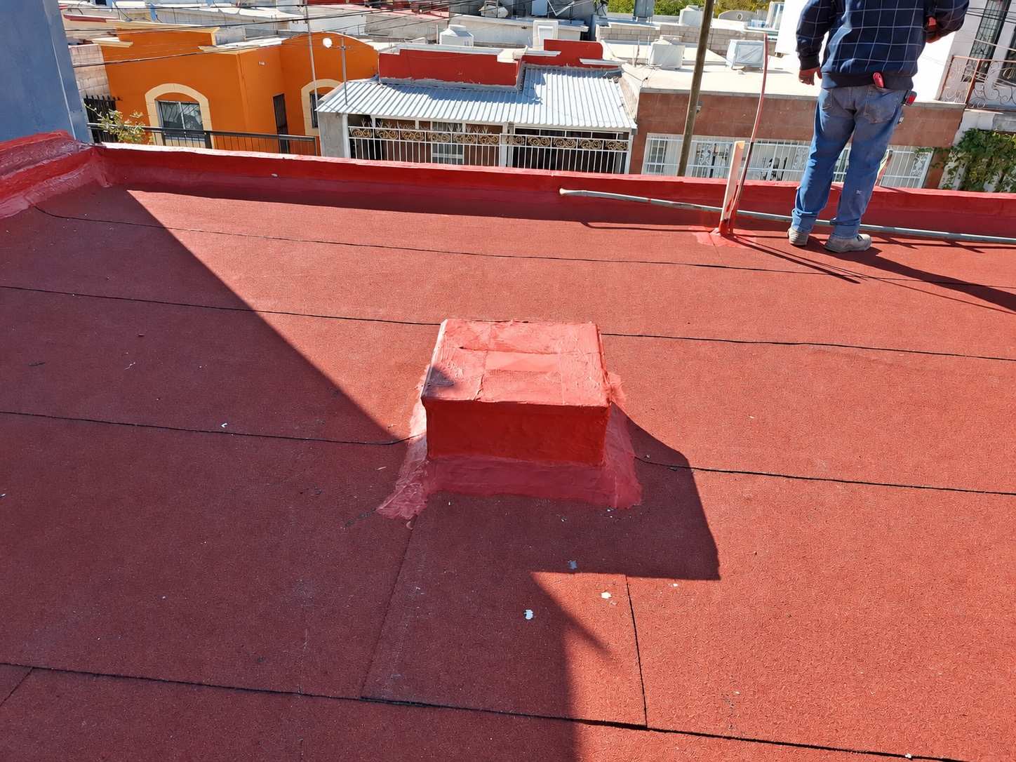 Detail of rooftop waterproofing and raised base